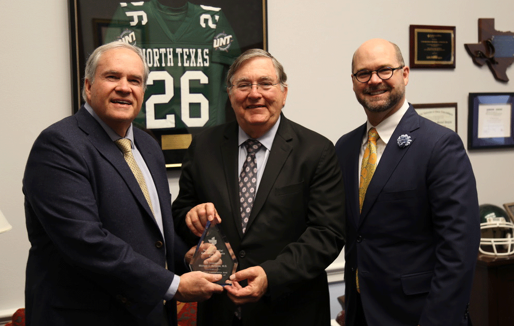 US Rep. Michael Burgess accepting the Texas Hospital Advocacy Tribute Award